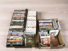 A collection of DVDs, Nintendo DS games, CDs, etc.