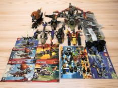 A group of LEGO models and figures including Ninjago and Legends of Chima.