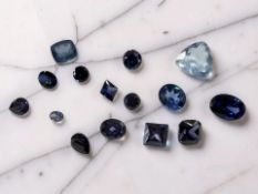 A group of synthetic/simulated tanzanites and zircon, suitable for mounting in jewellery,