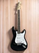 A Puretone electric guitar, with soft carry bag.