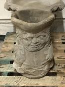 A large concrete Toby Jug planter,
