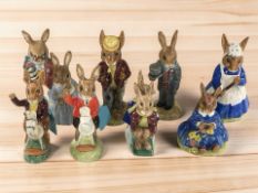 Eight Royal Doulton Bunnykins figurines.