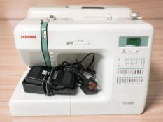 A Janome CC1000 digital sewing machine, with lead and pedal.