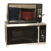 A Kenwood microwave and a Russell Hobbs microwave.