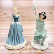 Two Royal Doulton Disney Princesses Collection figures 'Cinderella' and 'Jasmine'.