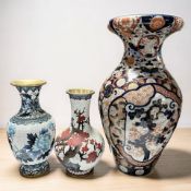 Two 20th century Japanese cloisonne vases, tallest 25 cm, and an imari baluster vase.