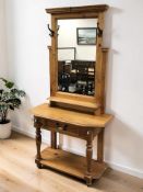 A reproduction pine mirror back hallstand, 101 cm x 44 cm x 192 cm.