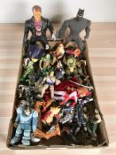 Assorted toys and figurines including Terminator, Masters of the Universe, etc.