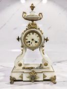 A 19th century alabaster and gilt metal mounted Portico mantel clock, with pendulum and key,