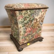 A Victorian tapestry work box, height 45 cm.
