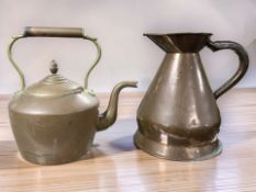 A Victorian copper kettle and a large jug, height 30 cm.