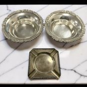 A pair of circular bonbon dishes, stamped Silver, diameter 12cm,