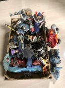 Assorted toys and figurines including Street Sharks, Toy Story, Batman, etc.