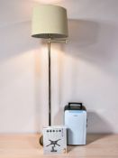 A contemporary brass standard lamp, a dehumidifier and a Logik TV mount, in box.