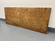 A large rectangular pine table top,