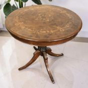 An Italian style inlaid burr wood effect circular occasional table, diameter 80 cm.