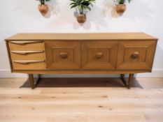 A 20th century Stonehill Furniture Stateroom teak low sideboard, 182 cm x 42 cm x 73 cm.
