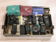 An Olympus OM20 35mm SLR camera body, with Carl Zeiss Jena 35-70mm lens,