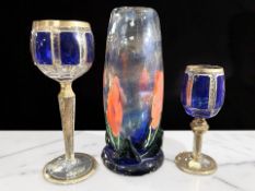A Caithness glass vase decorated with poppies, height 23 cm,