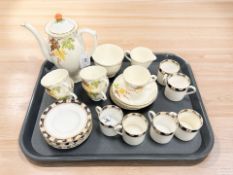 A thirteen-piece Delphine China Coffee Service, the set comprising a coffee pot, five coffee cans,