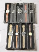 A group of reproduction military-style gent's wristwatches.