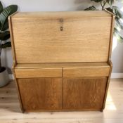 A teak Remploy fall front bureau, 92 cm x 40 cm x 107 cm.