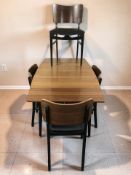 A 20th century G Plan Labrenza Range teak and ebonised pull-out extending dining table,