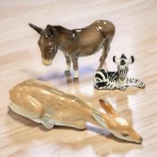 A Beswick china figure : Donkey, model 1364B (Tail attached to hind leg), brown gloss, height 12 cm,