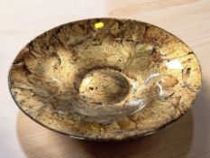 A contemporary glass fruit bowl,
