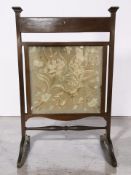An Edwardian mahogany tapestry fire screen, height 82 cm.