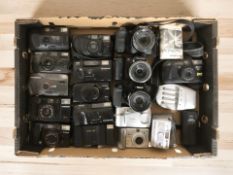 A collection of film and digital cameras including Hanimex, Canon, Chinon, Olympus, Minolta,
