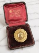 A Victorian memorial brooch, stamped 15ct, diameter 2.8cm CONDITION REPORT: 4.