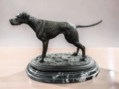 A contemporary bronze figure of a dog after Mene, on stepped black marble plinth, length 35 cm.