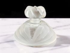 A Lalique frosted glass scent bottle and stopper, height 6 cm.