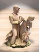 A terracotta figure group of harvesters, height 31 cm.