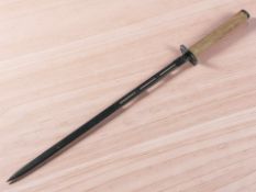 A reproduction sword, length 90 cm.