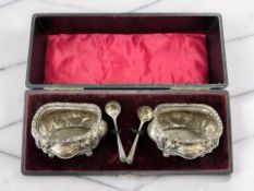 A cased pair of silver salts and spoons, Birmingham 1909. CONDITION REPORT: 93.