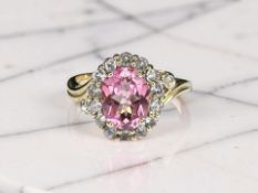 A 9ct gold pink stone dress ring, size Q CONDITION REPORT: 3.