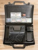 A SEGA Gamegear portable video game system, in carry case with several video games.