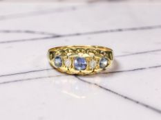 An 18ct gold sapphire and diamond five-stone ring, size O CONDITION REPORT: 2.
