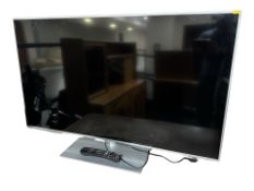 A Panasonic 50 inch LCD TV with lead and remote