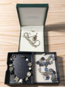 A small group of jewellery including a silver and peridot pendant, costume necklace and bracelet,