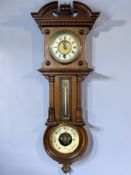 A walnut cased combination wall timepiece / thermometer / barometer, with pendulum and key,
