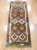A Chobi Kilim runner,