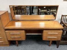 A G-Plan Fresco teak twin pedestal mirror back dressing table, 153 cm x 48 cm x 113 cm.