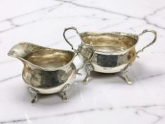 A George V silver sugar bowl and matching milk jug, William Hutton & Sons Ltd, Sheffield 1918,