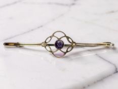 A 9ct gold amethyst and pearl brooch, width 5.5cm CONDITION REPORT: 2.