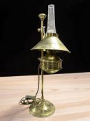 A brass table lamp, height 61 cm.