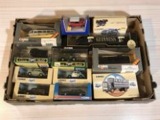 A collection of boxed die cast cars, haulage vehicles,