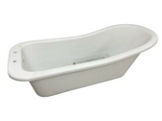 A free standing bath with painted cast feet and chrome fittings,